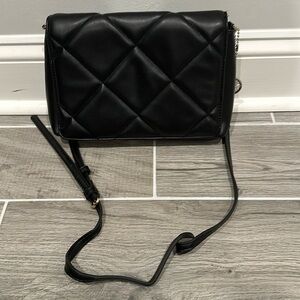 Black purse 11 inches wide 7 1/2 inches tall